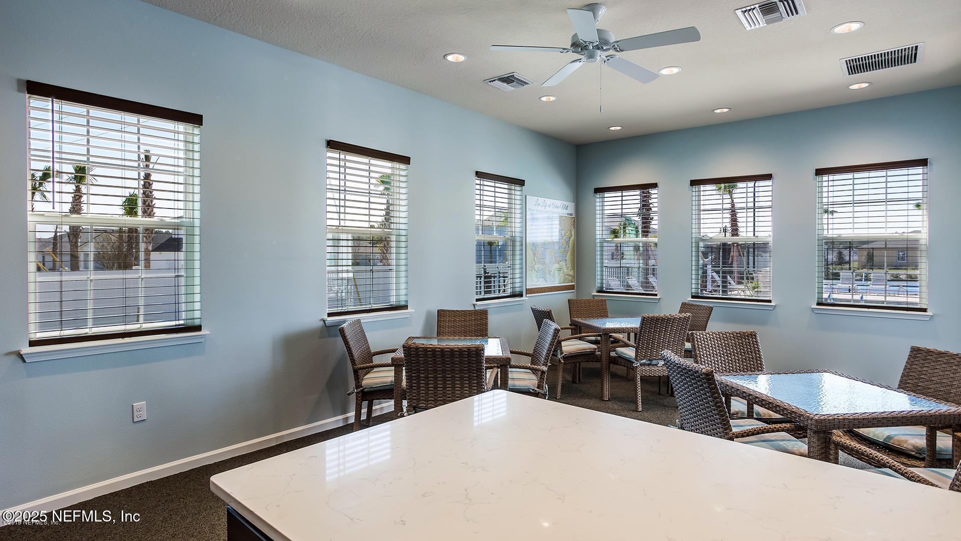 516 Lumpkin Street Jacksonville, FL 32222 - Photo 40 of 45 a living room with furniture two window and wooden floor