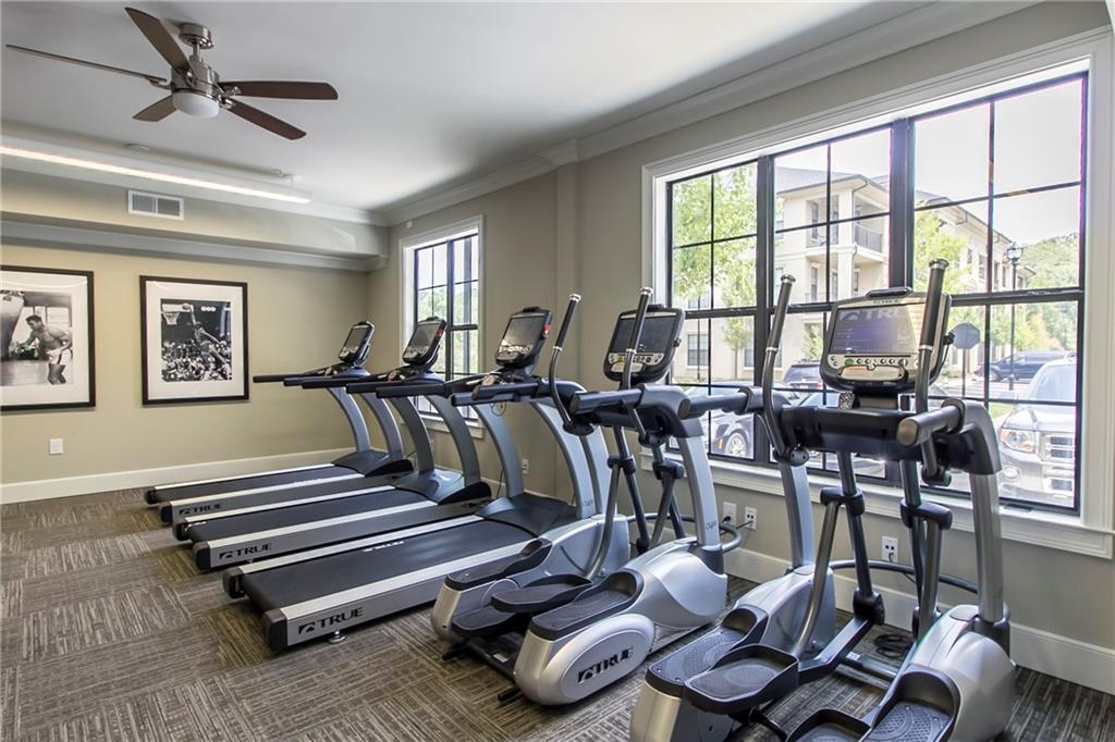4011 Roswell Road, Unit 2311 Atlanta, GA 30342 - Photo 30 of 39 a very nice looking living room with furniture and a window