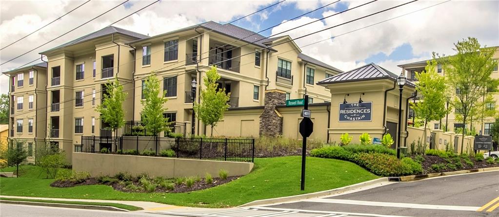 4011 Roswell Road, Unit 2311 Atlanta, GA 30342 - Photo 38 of 39 front view of a house with a yard