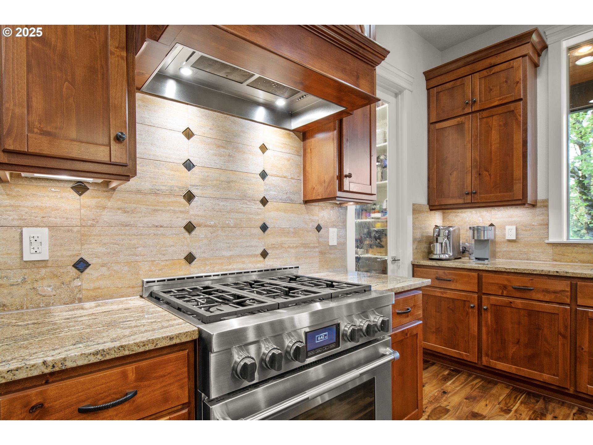 2215 Northwest 17th Avenue Camas, WA 98607 - Photo 13 of 48 a kitchen with stainless steel appliances granite countertop a stove and a sink