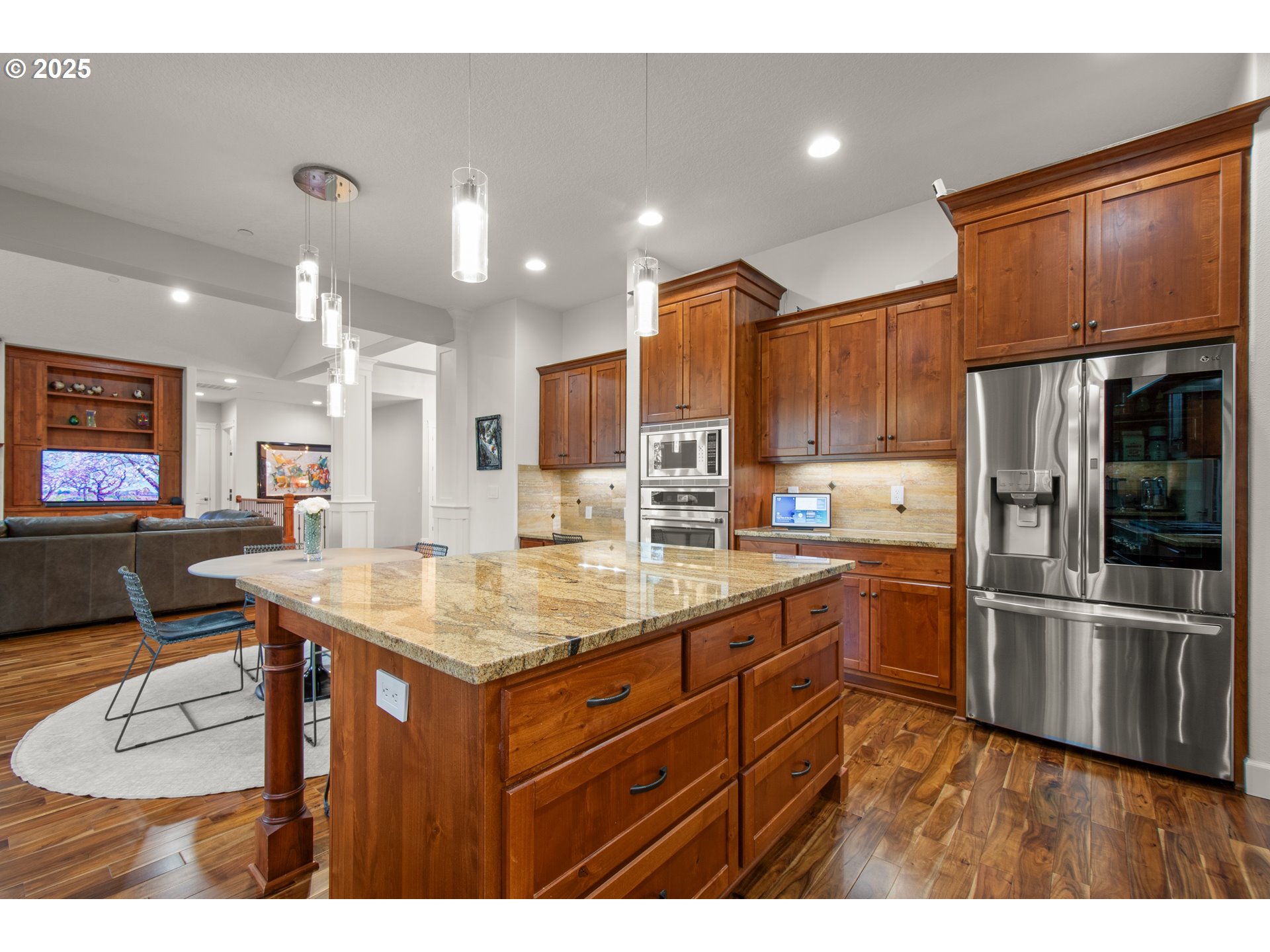 2215 Northwest 17th Avenue Camas, WA 98607 - Photo 14 of 48 a kitchen with stainless steel appliances granite countertop a sink a stove and a refrigerator