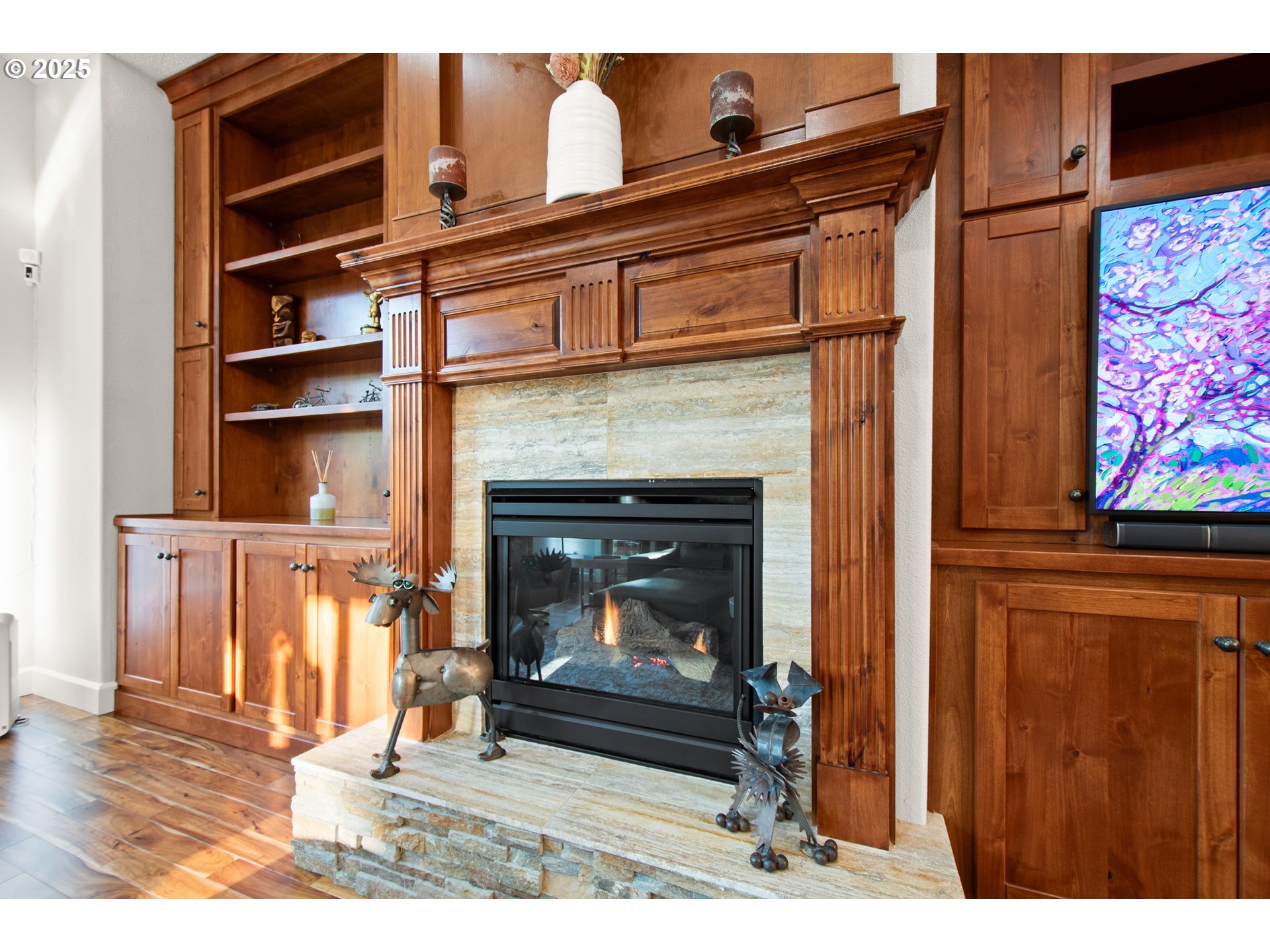 2215 Northwest 17th Avenue Camas, WA 98607 - Photo 18 of 48 a living room with furniture a flat screen tv and a fireplace