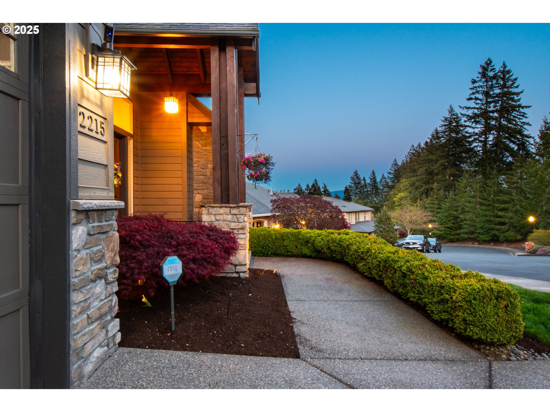 2215 Northwest 17th Avenue Camas, WA 98607 - Photo 2 of 48 a backyard of a house with open aquarium and outdoor seating