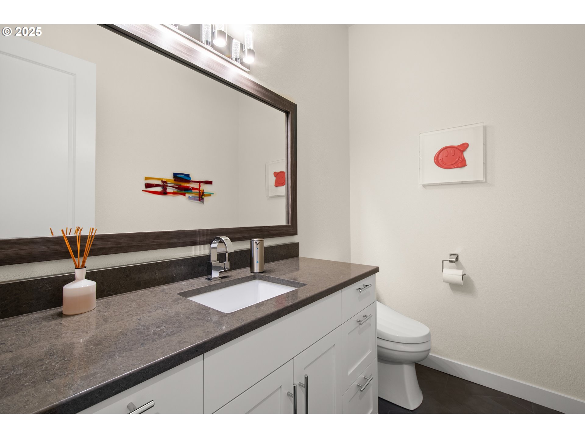 2215 Northwest 17th Avenue Camas, WA 98607 - Photo 31 of 48 a bathroom with a sink mirror vanity and toilet