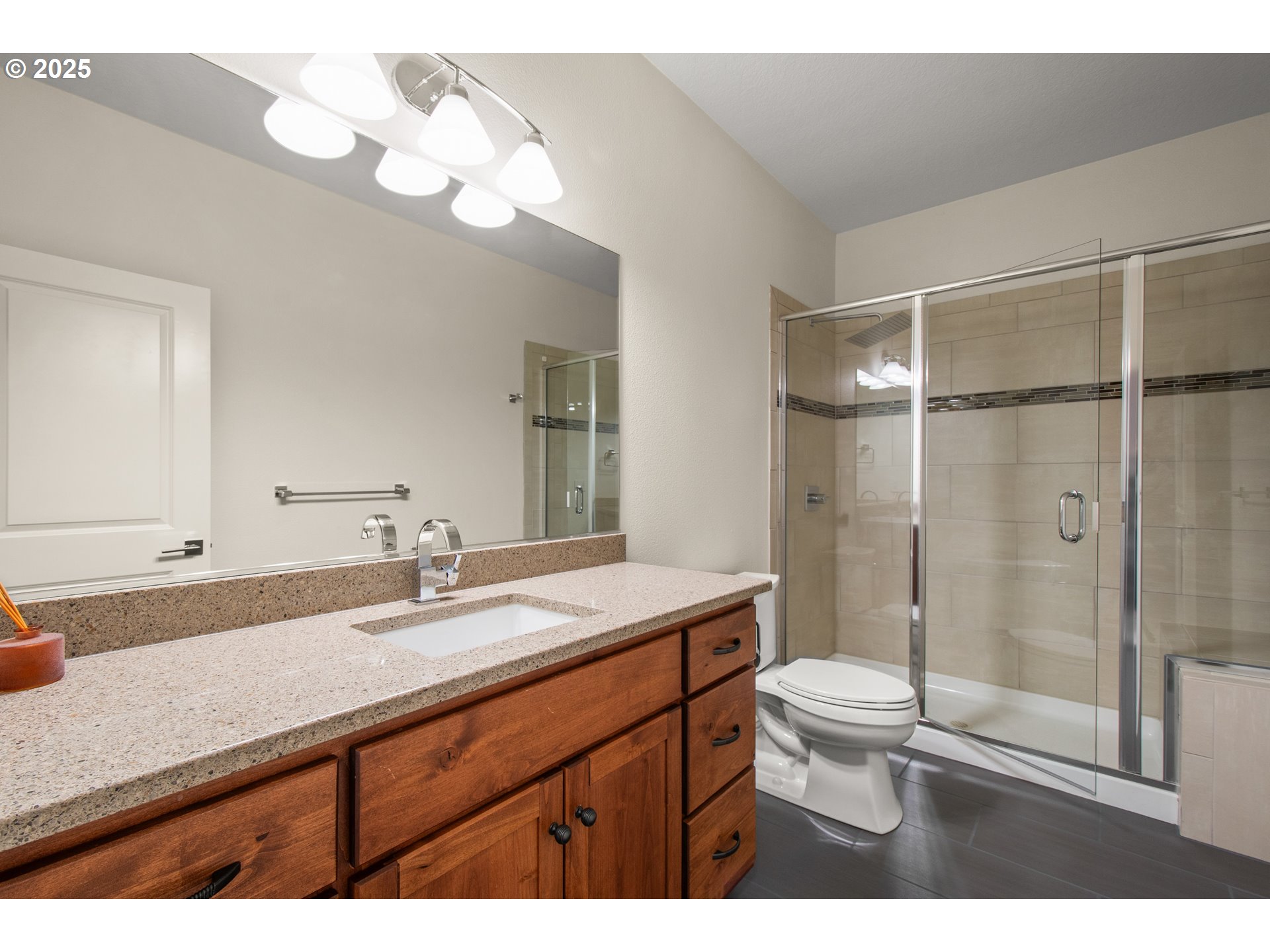 2215 Northwest 17th Avenue Camas, WA 98607 - Photo 34 of 48 a bathroom with a sink a toilet and shower