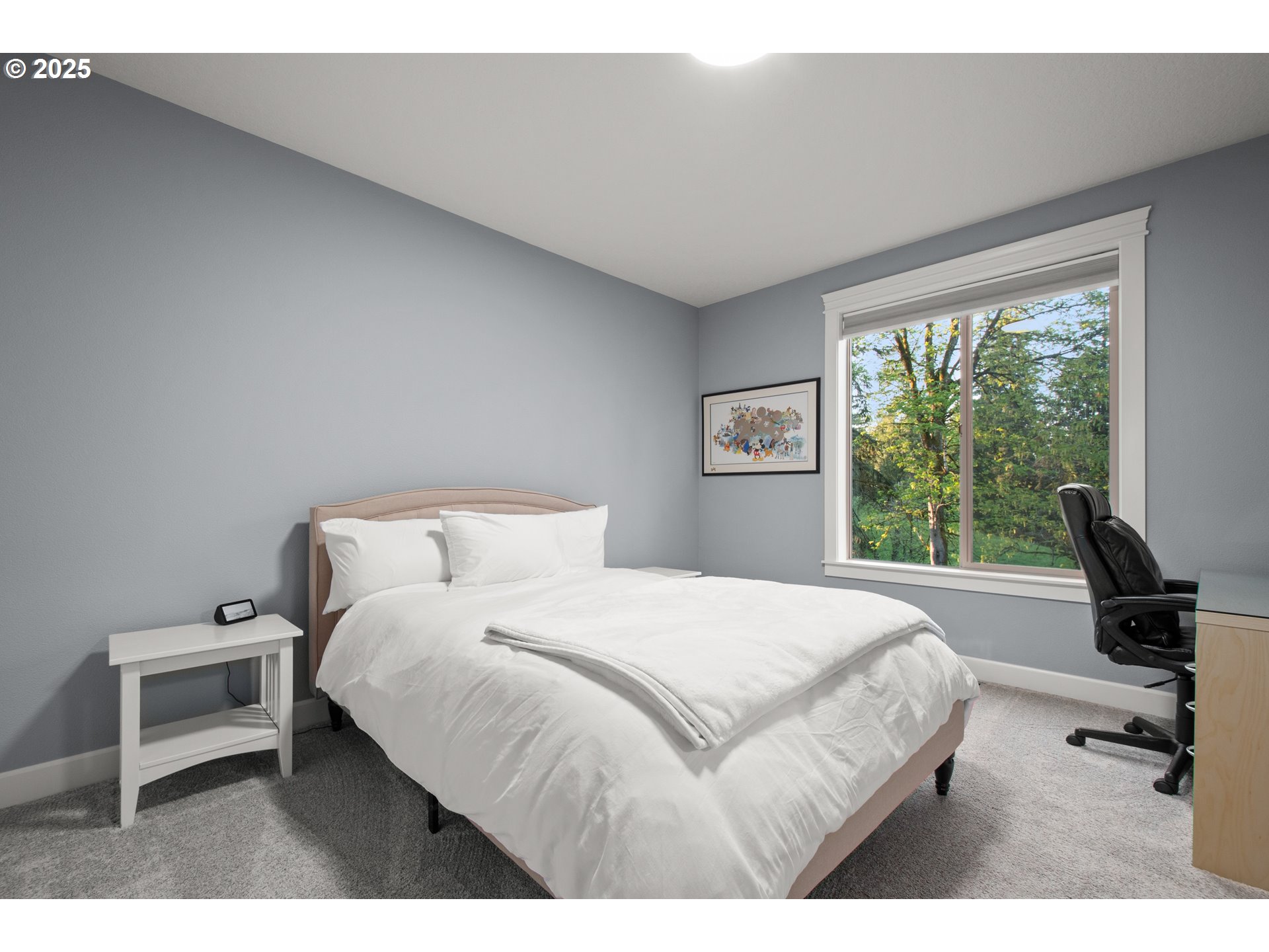 2215 Northwest 17th Avenue Camas, WA 98607 - Photo 35 of 48 a bedroom with a bed a chair and a large window
