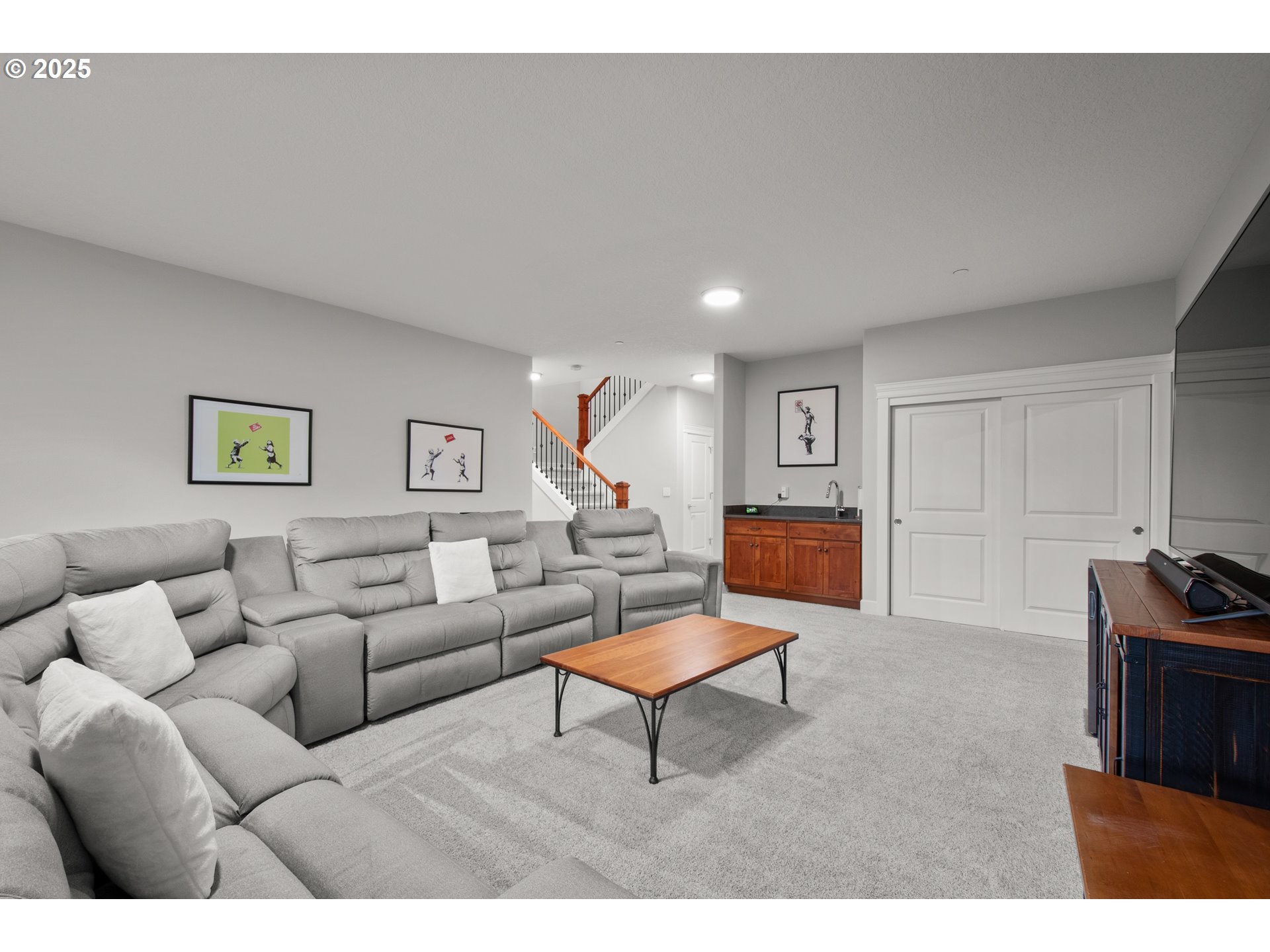 2215 Northwest 17th Avenue Camas, WA 98607 - Photo 39 of 48 a living room with furniture and a wooden floor