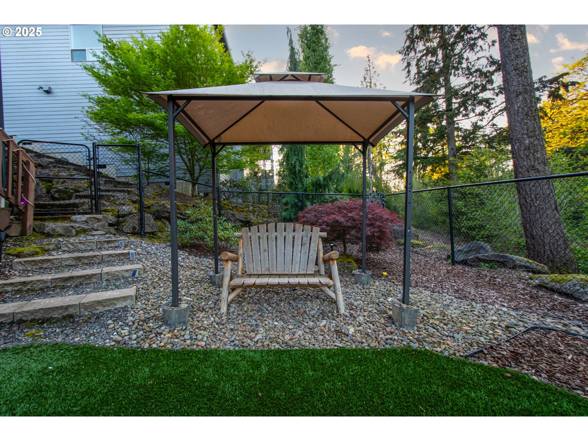 2215 Northwest 17th Avenue Camas, WA 98607 - Photo 41 of 48 a backyard of a house with table and chairs