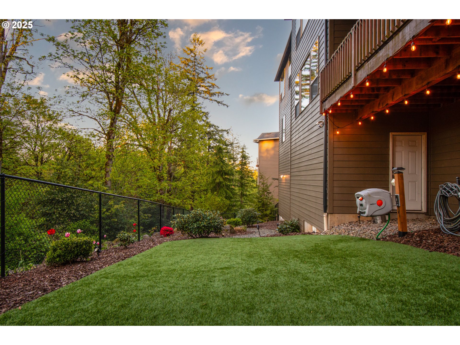 2215 Northwest 17th Avenue Camas, WA 98607 - Photo 46 of 48 a view of a chair and tables in the backyard