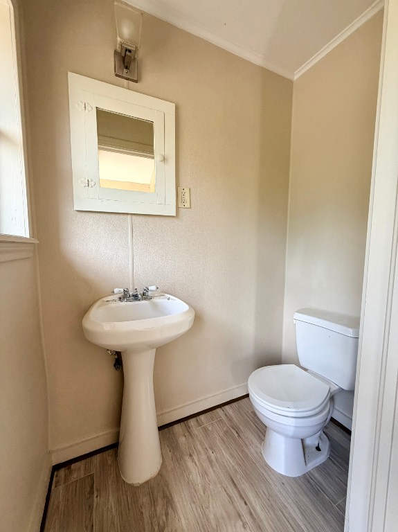 612 Keith Street Kennard, TX 75847 - Photo 15 of 15 a bathroom with a toilet sink and mirror