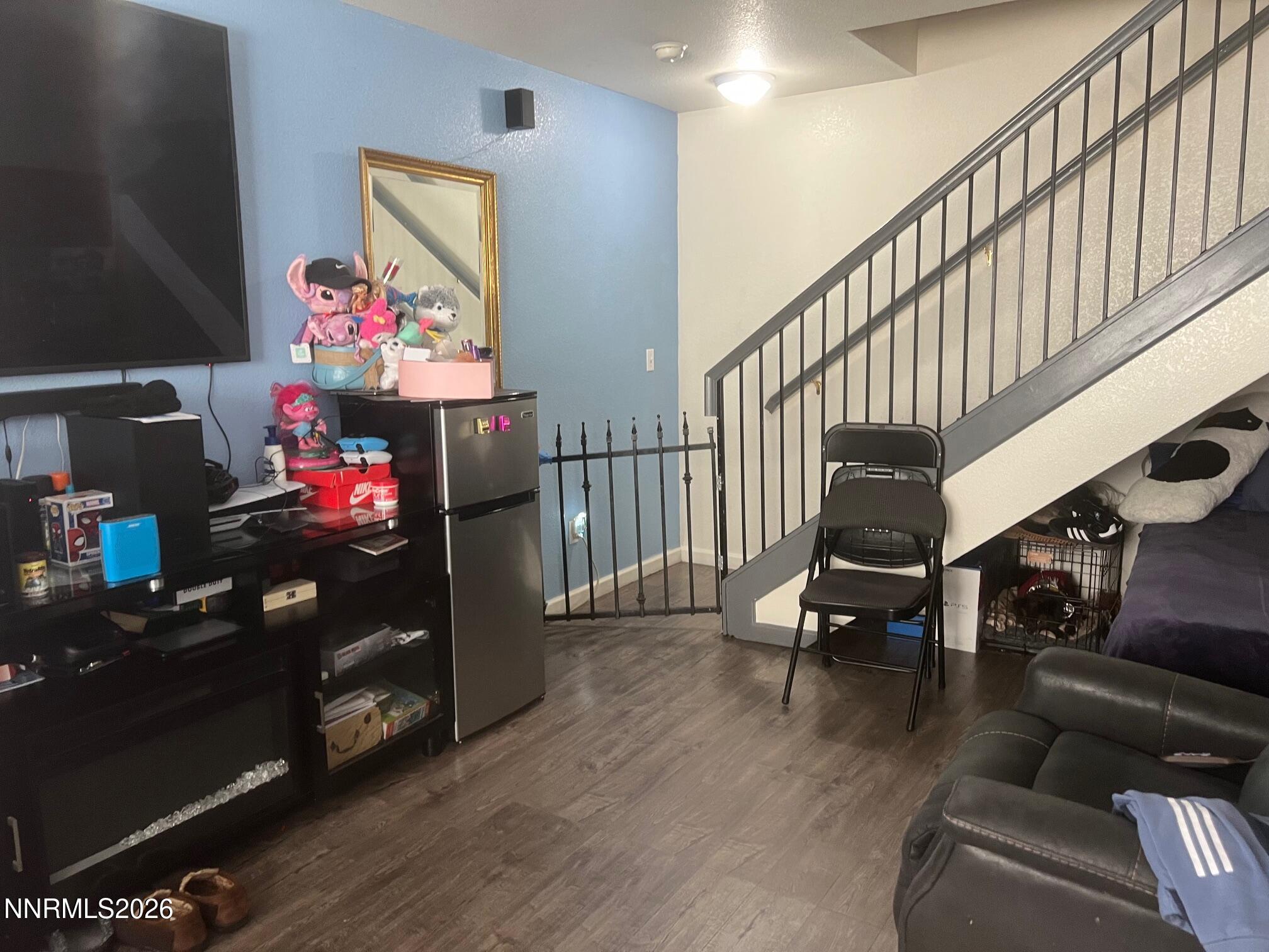 5021 Catalina Drive, Unit 2 Reno, NV 89502 - Photo 2 of 9 a living room with furniture and wooden floor