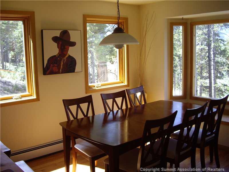 79 Bearing Tree Road Breckenridge, CO 80424 - Photo 6 of 25 a view of a dining room with furniture window and outside view
