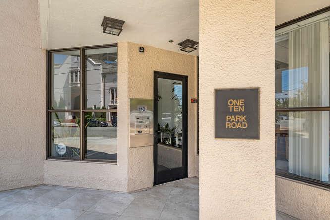 110 Park Road, Unit 108 Burlingame, CA 94010 - Photo 2 of 27 a view of a hallway with a elevator