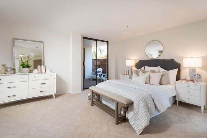 110 Park Road, Unit 108 Burlingame, CA 94010 - Photo 16 of 27 a spacious bedroom with a bed and window
