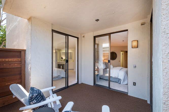 110 Park Road, Unit 108 Burlingame, CA 94010 - Photo 22 of 27 a bedroom with furniture and a window