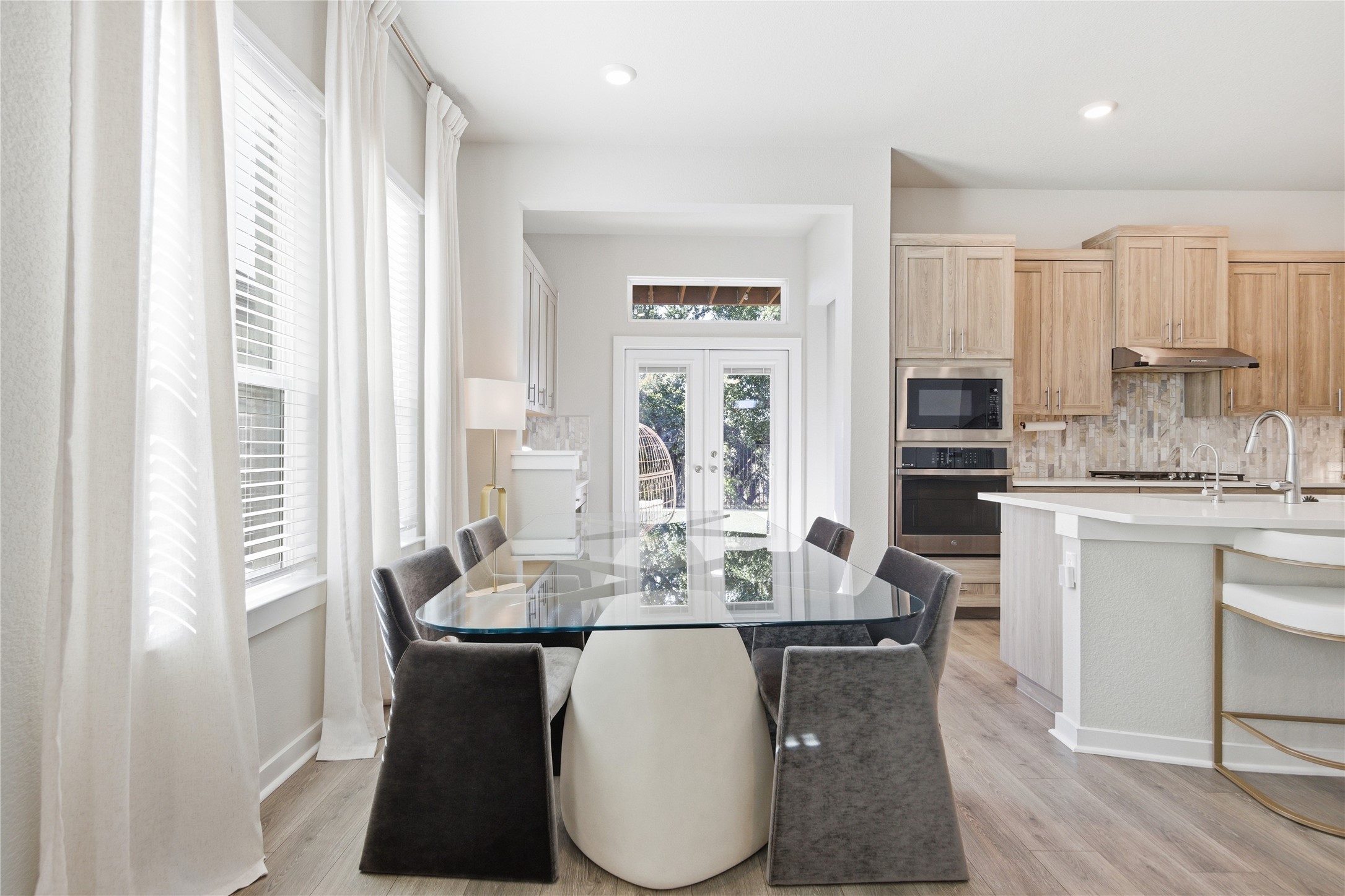 1008 Summer Glen Georgetown, TX 78628 - Photo 15 of 34 a view of a dining room with furniture and wooden floor