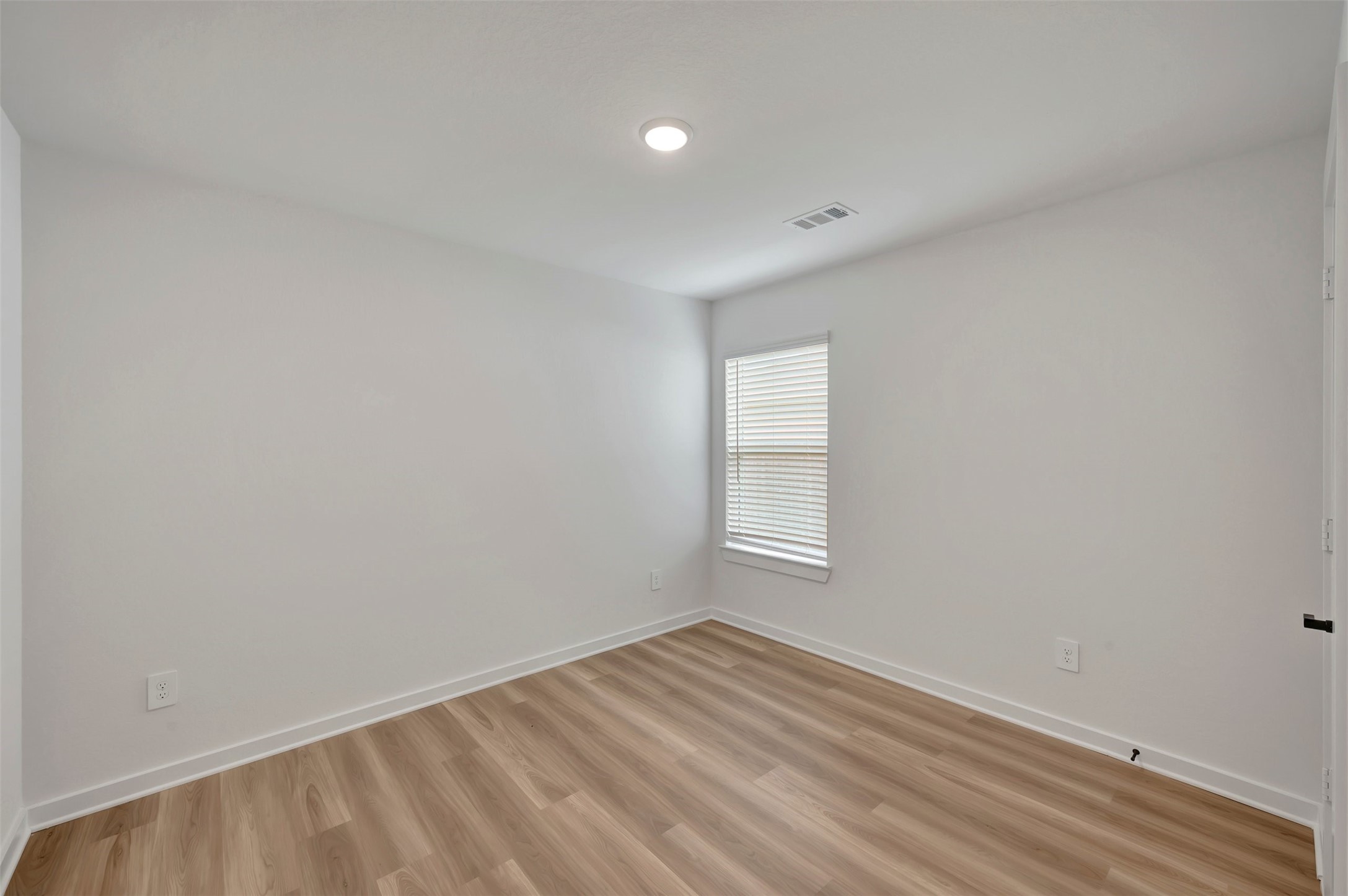 759 Hackberry Branch Magnolia, TX 77354 - Photo 30 of 43 wooden floor in an empty room