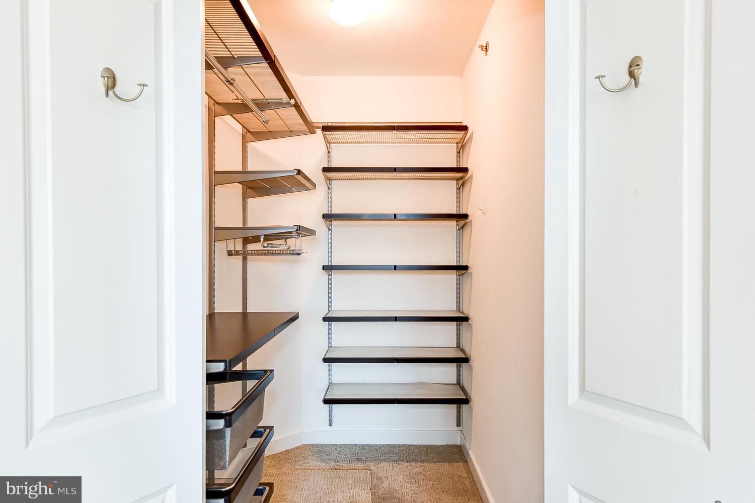 777 7th Street Northwest, Unit 924 Washington, DC 20001 - Photo 19 of 25 a view of a room with shelves