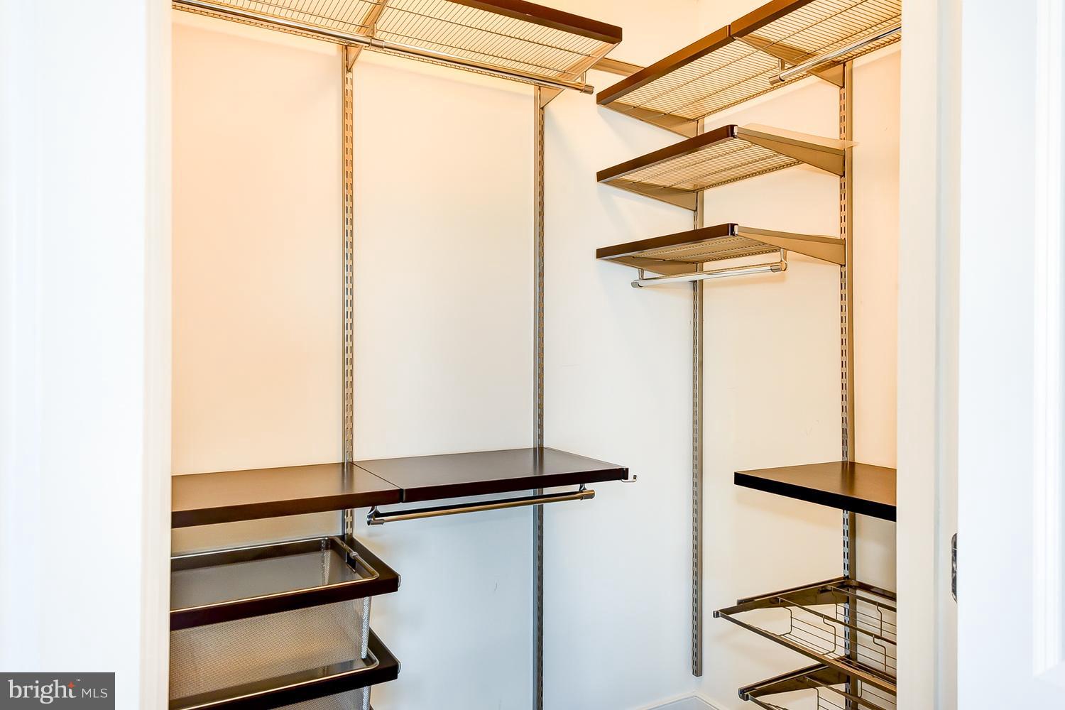 777 7th Street Northwest, Unit 924 Washington, DC 20001 - Photo 23 of 25 a view of a room with rack on the wall
