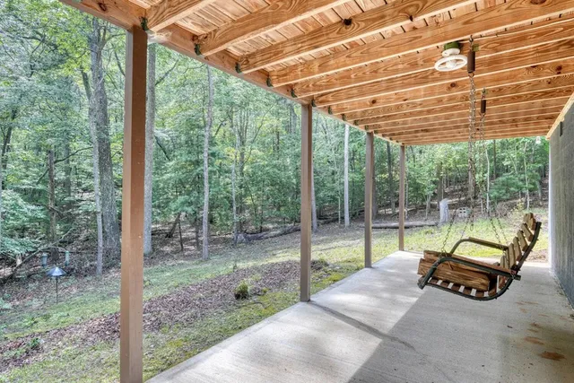 a view of backyard with green space