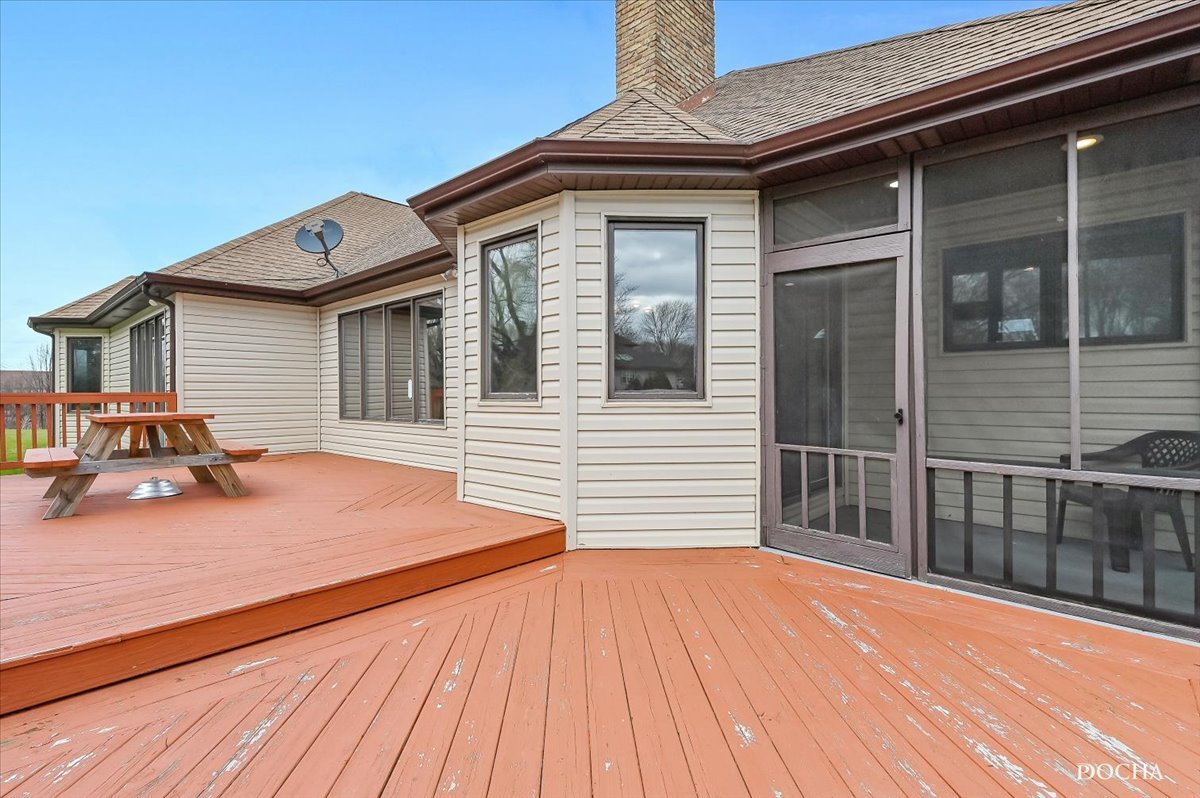 9638 Book Road Naperville, IL 60564 - Photo 39 of 44 a backyard of a house with barbeque oven table and chairs