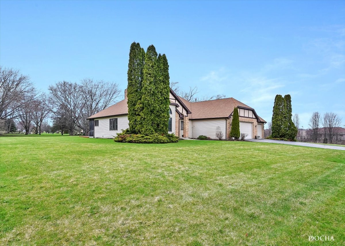 9638 Book Road Naperville, IL 60564 - Photo 44 of 44 a front view of a house with garden