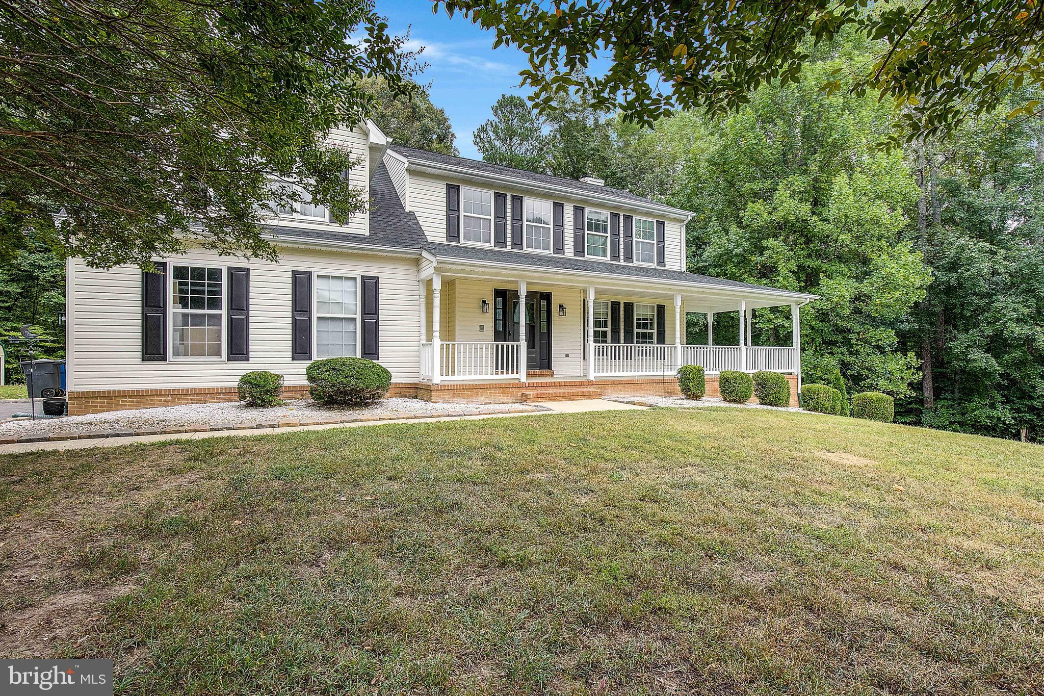 721 Small Reward Road Huntingtown, MD 20639 - Photo 50 of 51 a house view with a garden space