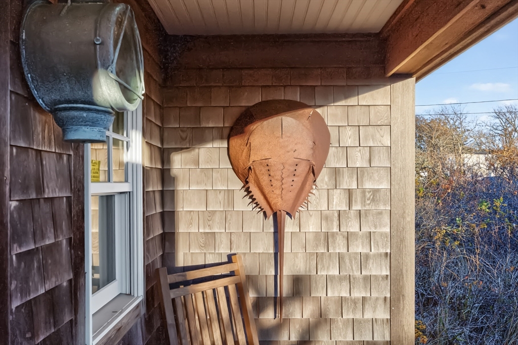 1145 Kingsbury Beach Road Eastham, MA 02642 - Photo 37 of 42 a view of staircase with large window