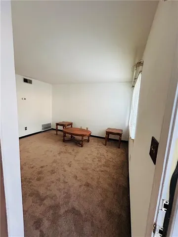 a view of a room with racks on the wall