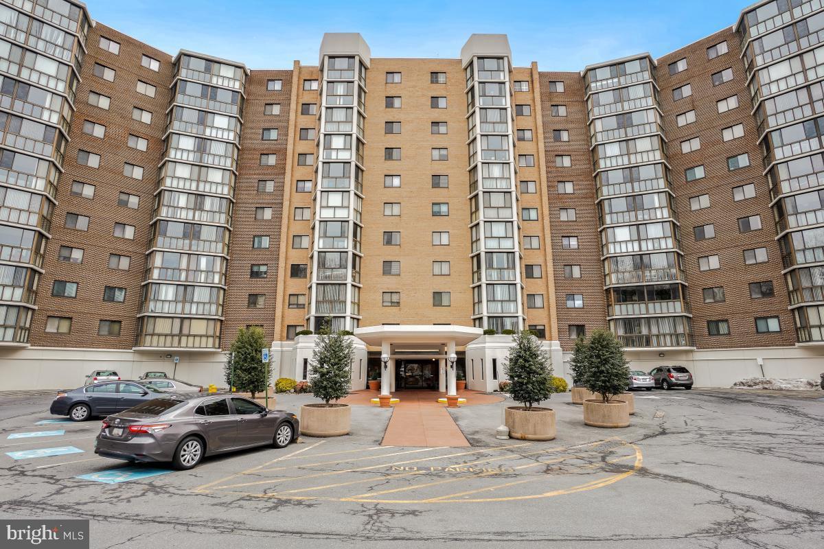 15100 Interlachen Drive, Unit 4520 Silver Spring, MD 20906 - Photo 28 of 39 Modern high-rise with inviting entrance.