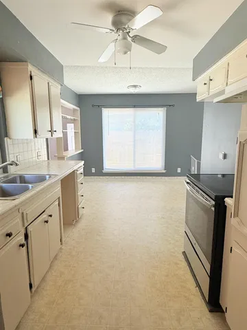 a bathroom with a sink a vanity and mirror