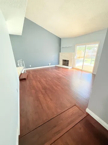 a room with a bed and a window