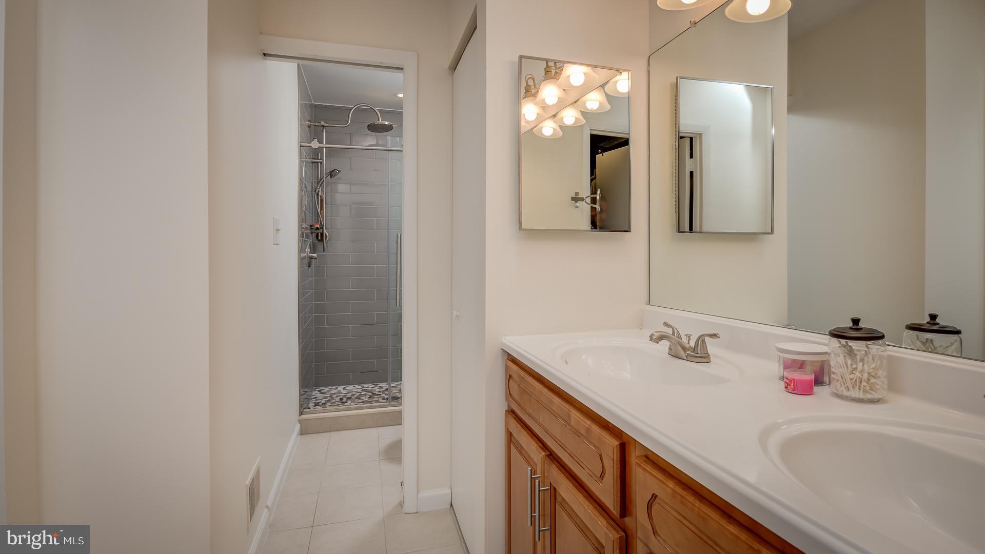 2318 Glade Bank Way Reston, VA 20191 - Photo 24 of 32 Beautiful master bath with remodeled shower