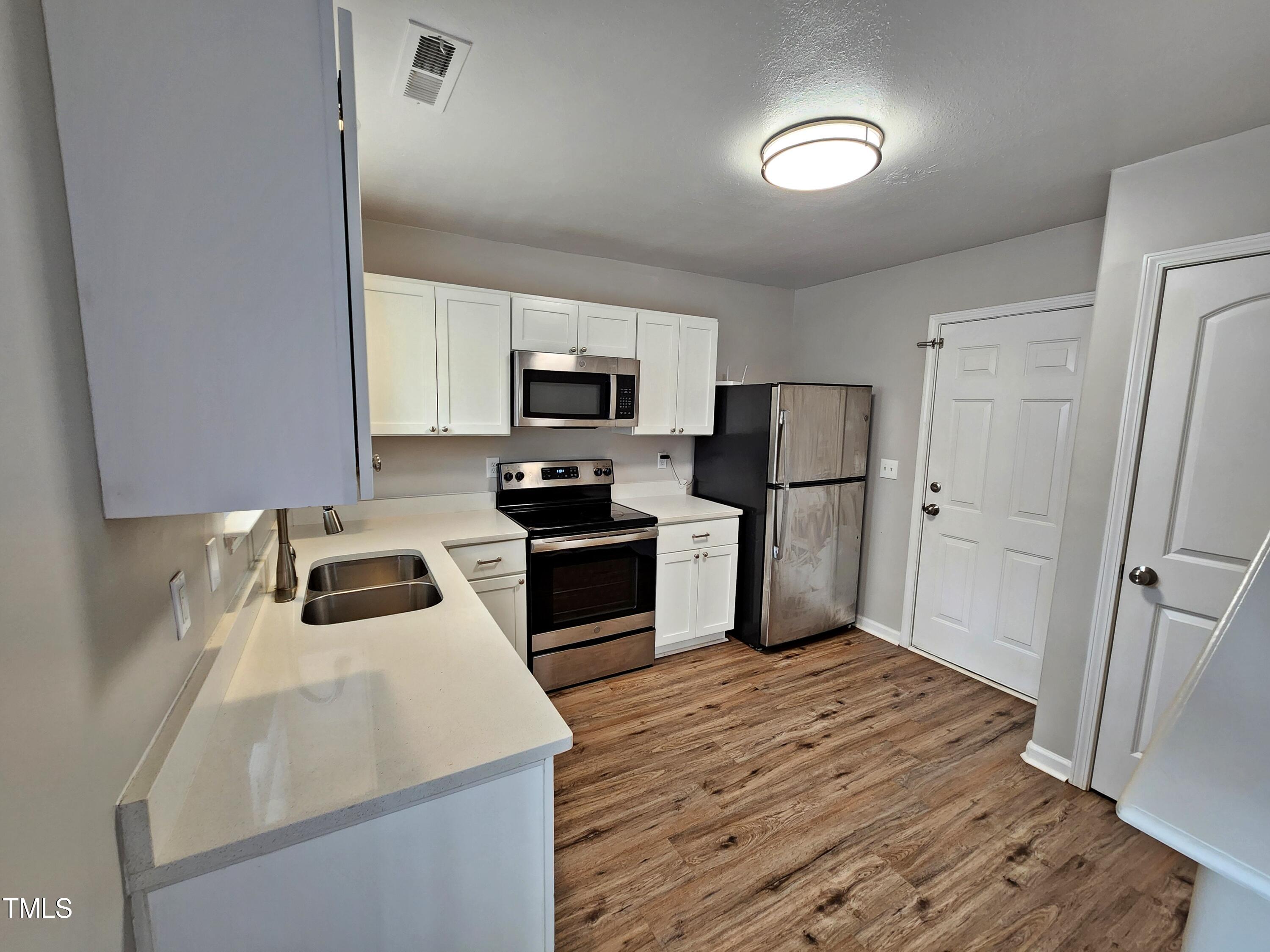 1706 Mayridge Lane Raleigh, NC 27610 - Photo 12 of 28 Kitchen 1a