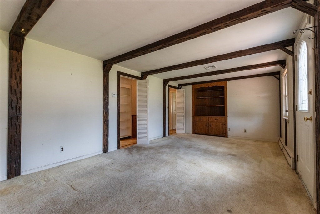249 Main Street Walpole, MA 02081 - Photo 13 of 31 a view of an empty room and window