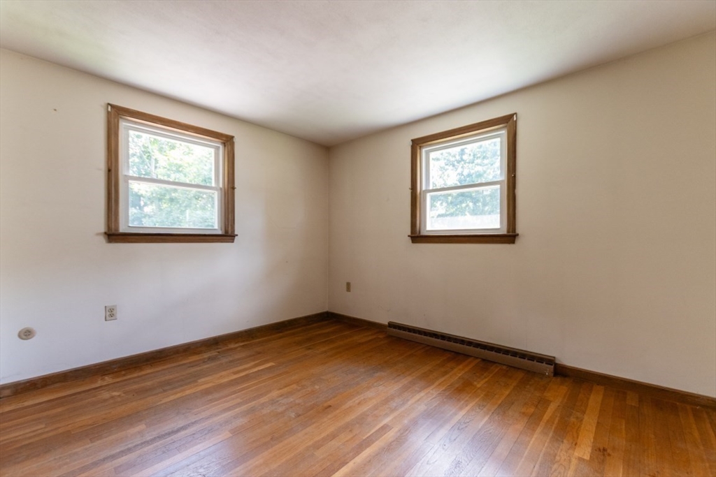 249 Main Street Walpole, MA 02081 - Photo 16 of 31 a view of a room with wooden floor and window