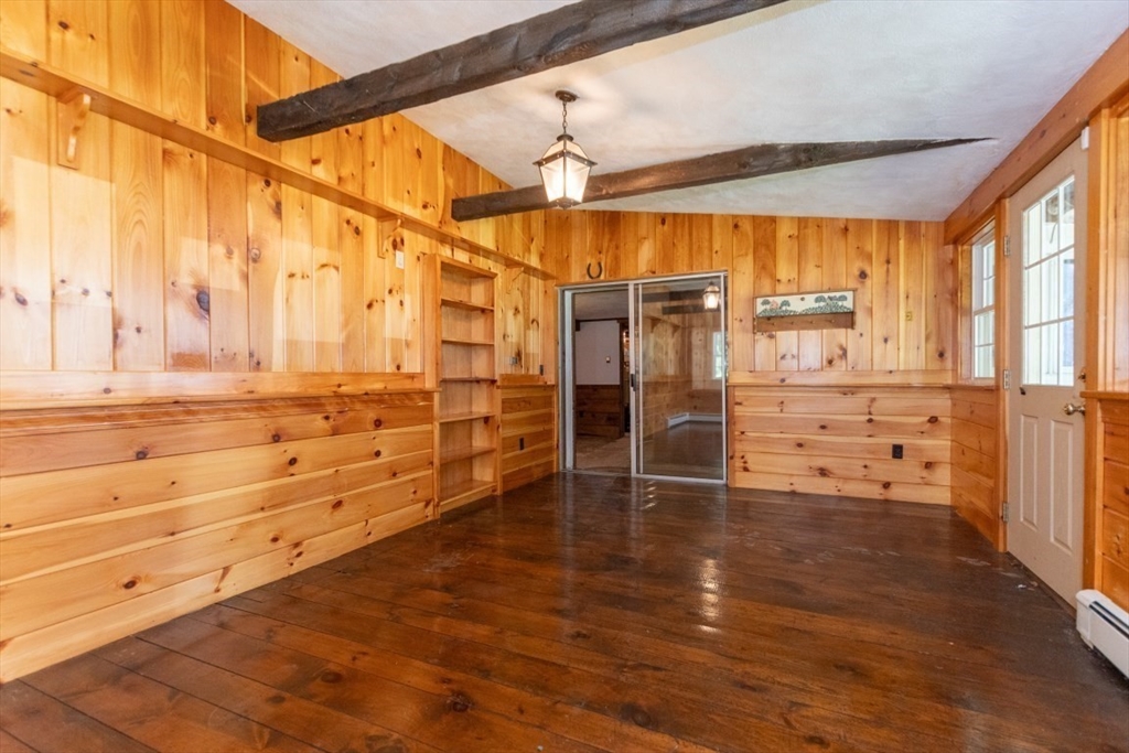 249 Main Street Walpole, MA 02081 - Photo 22 of 31 a view of walk in closet with wooden floor