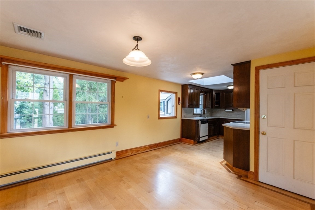 249 Main Street Walpole, MA 02081 - Photo 7 of 31 a view of a kitchen with a sink and dishwasher kitchen view