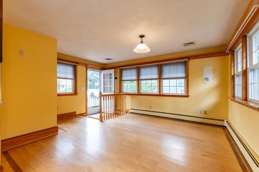 249 Main Street Walpole, MA 02081 - Photo 8 of 31 a view of an empty room with a window