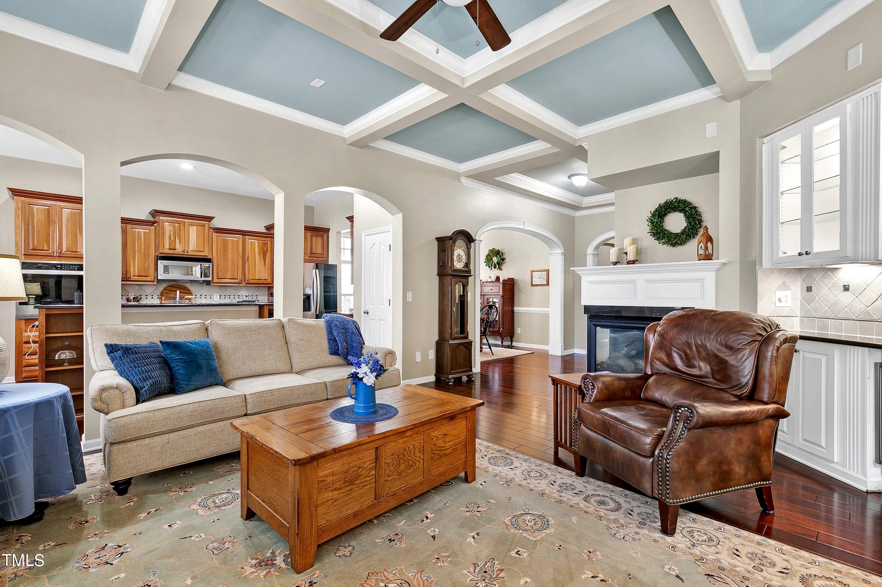6115 Leesburg Lane Raleigh, NC 27617 - Photo 11 of 46 a living room with furniture and a large window