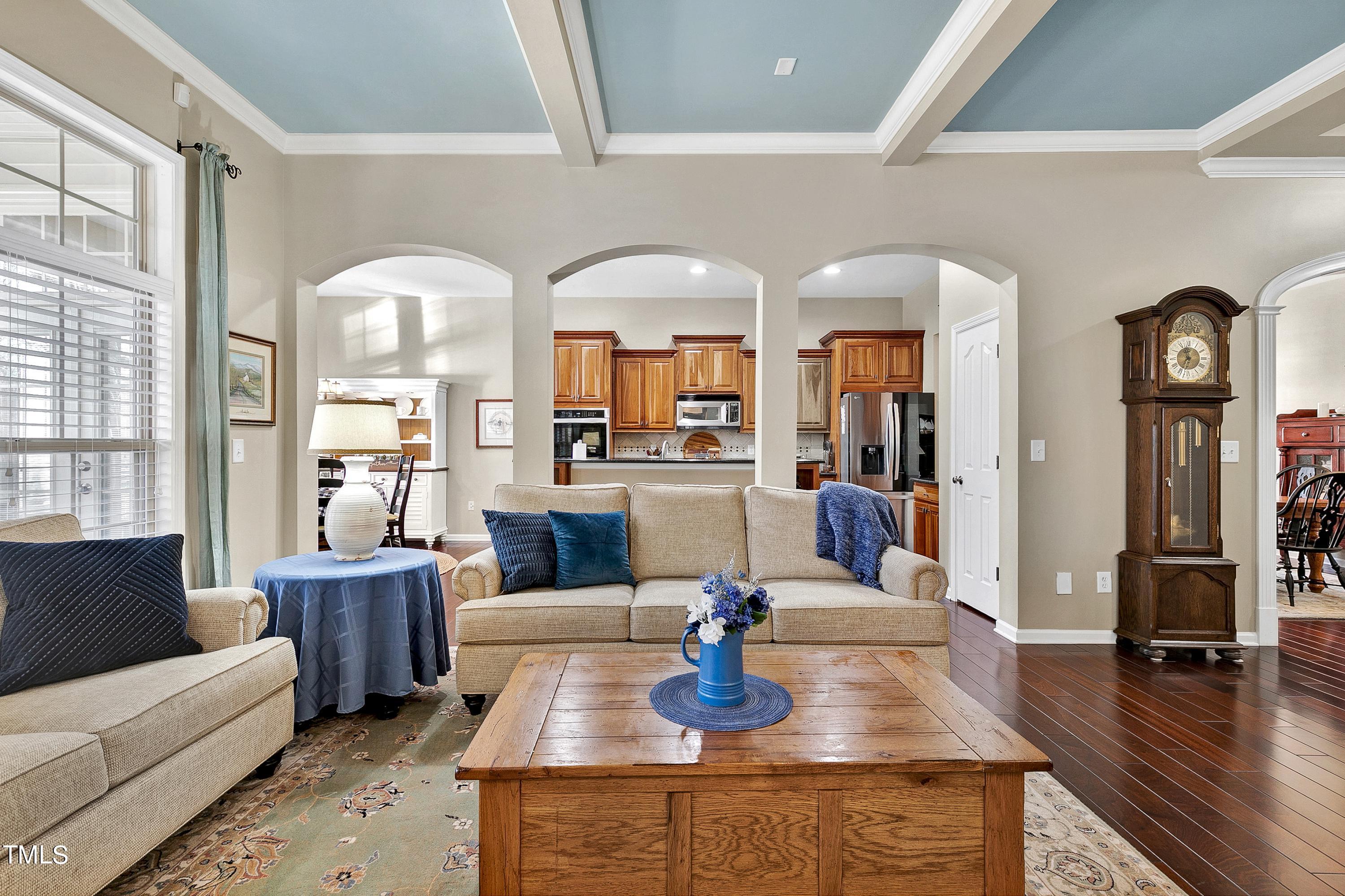 6115 Leesburg Lane Raleigh, NC 27617 - Photo 13 of 46 a living room with fireplace furniture and a wooden floor