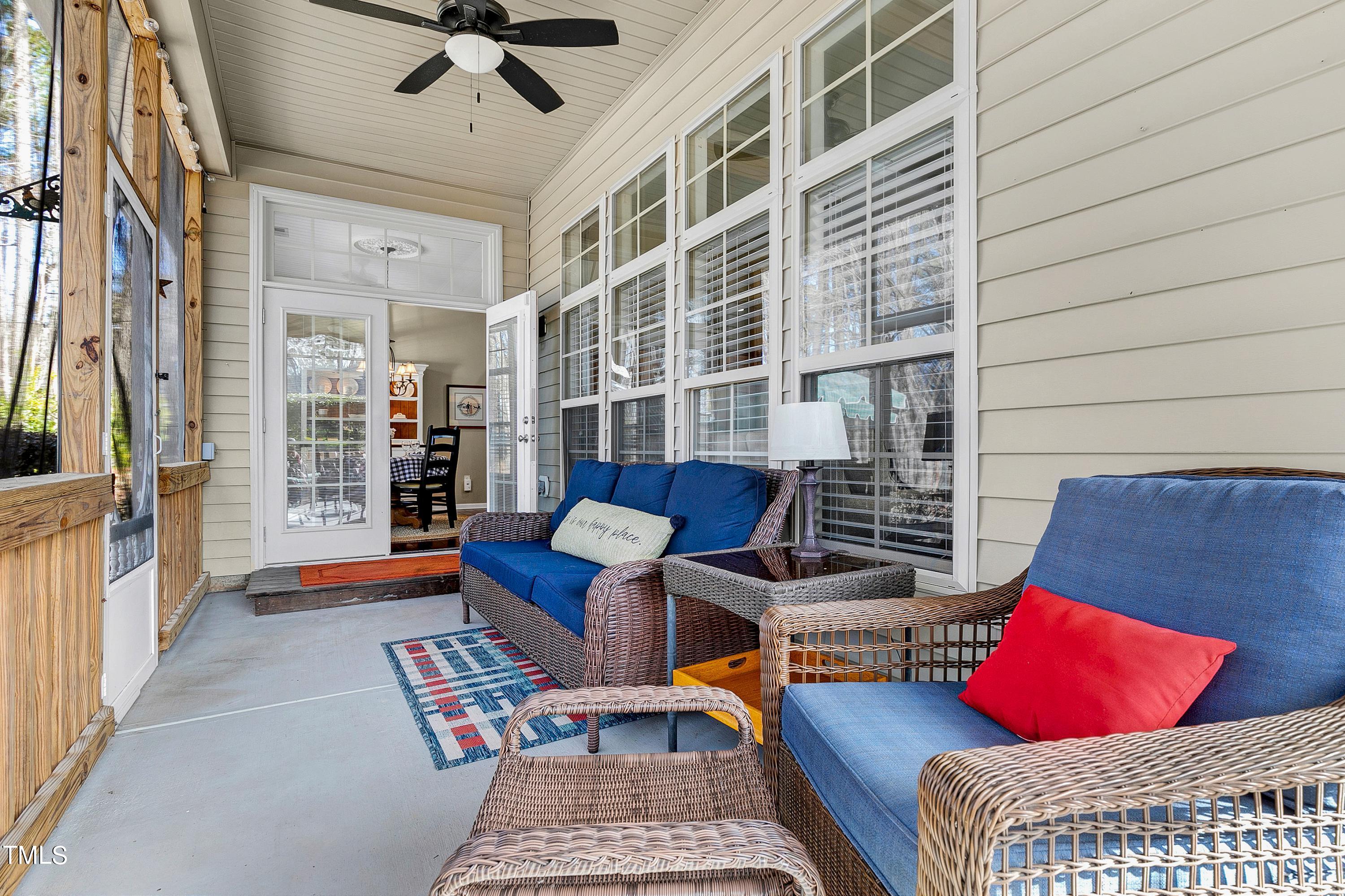 6115 Leesburg Lane Raleigh, NC 27617 - Photo 22 of 46 a outdoor space with patio couches and a potted plant on a rug