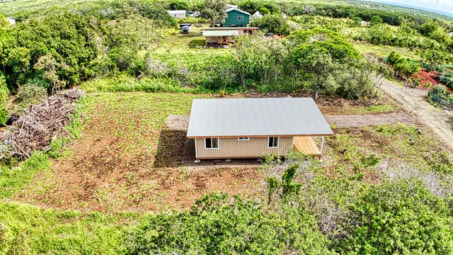 a view of a yard with an outdoor space