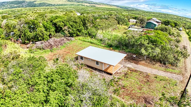a house view with a garden space