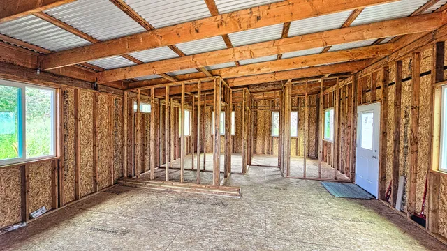 a view of a porch with wooden floor and stairs