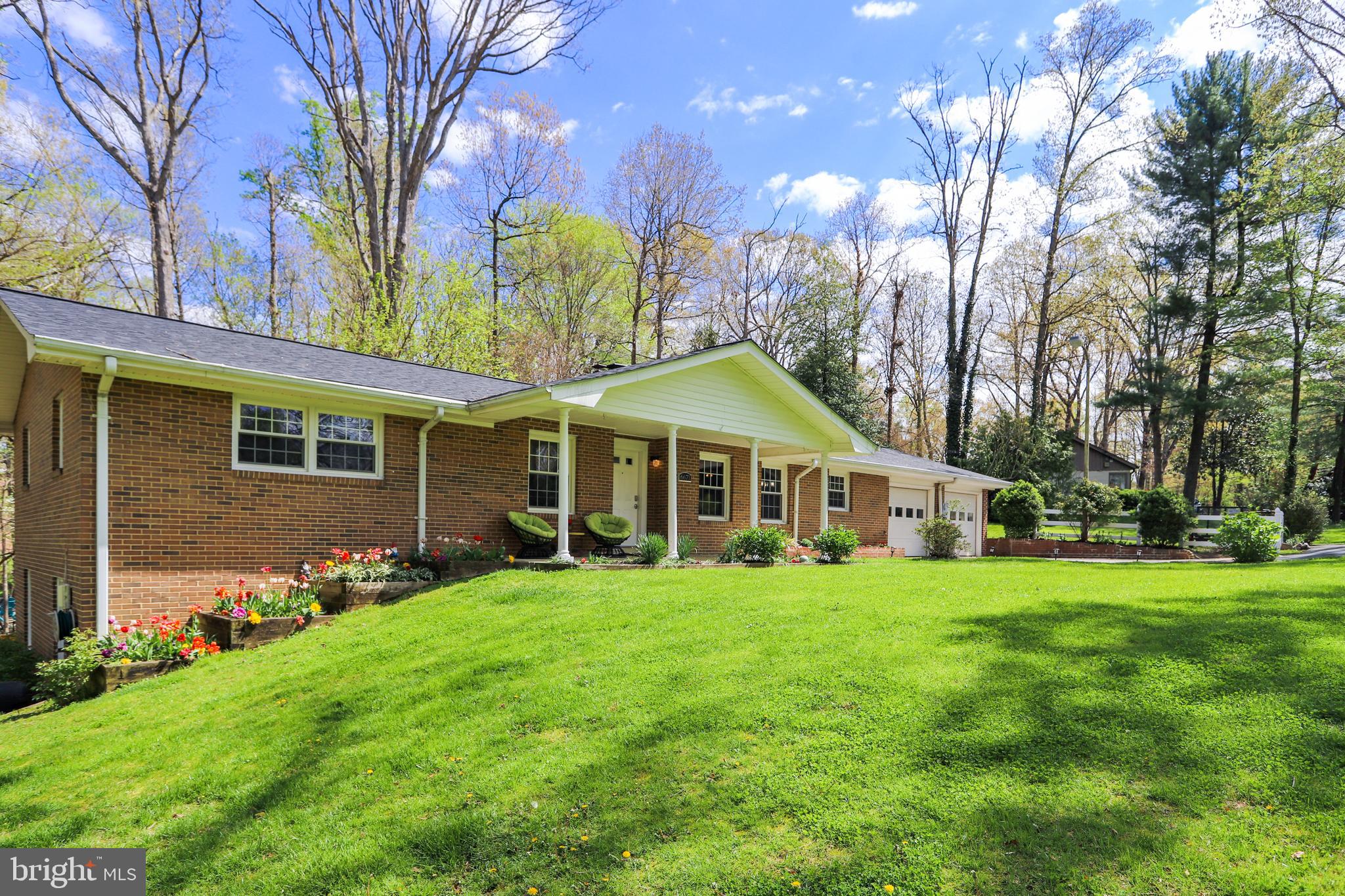 6671 Ridgeway Drive Springfield, VA 22150 - Photo 3 of 53 a view of a house with a yard