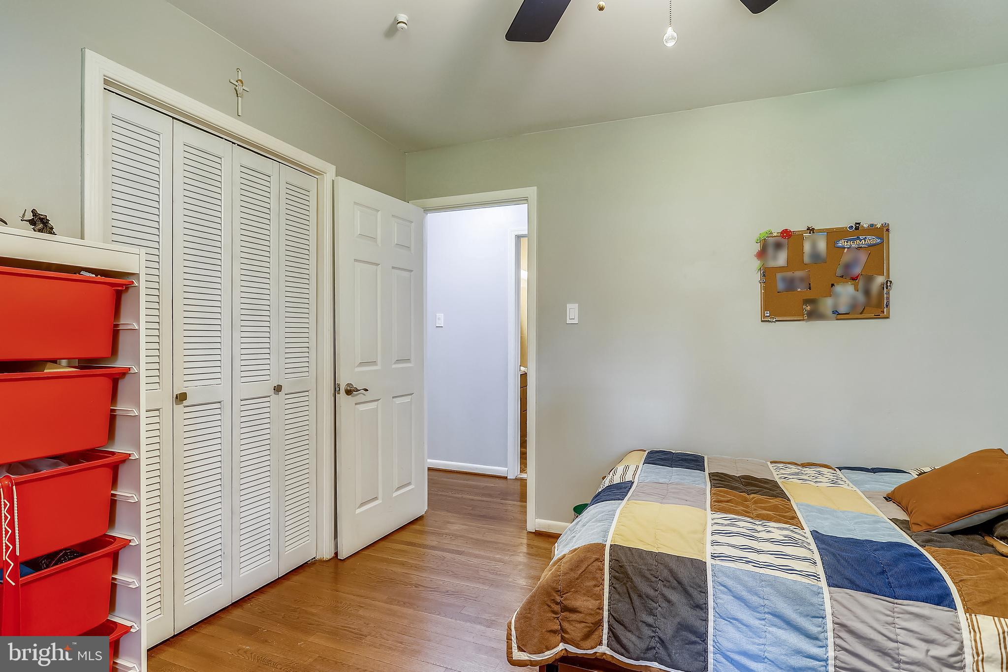 6671 Ridgeway Drive Springfield, VA 22150 - Photo 25 of 53 a bed room with a bed and a table
