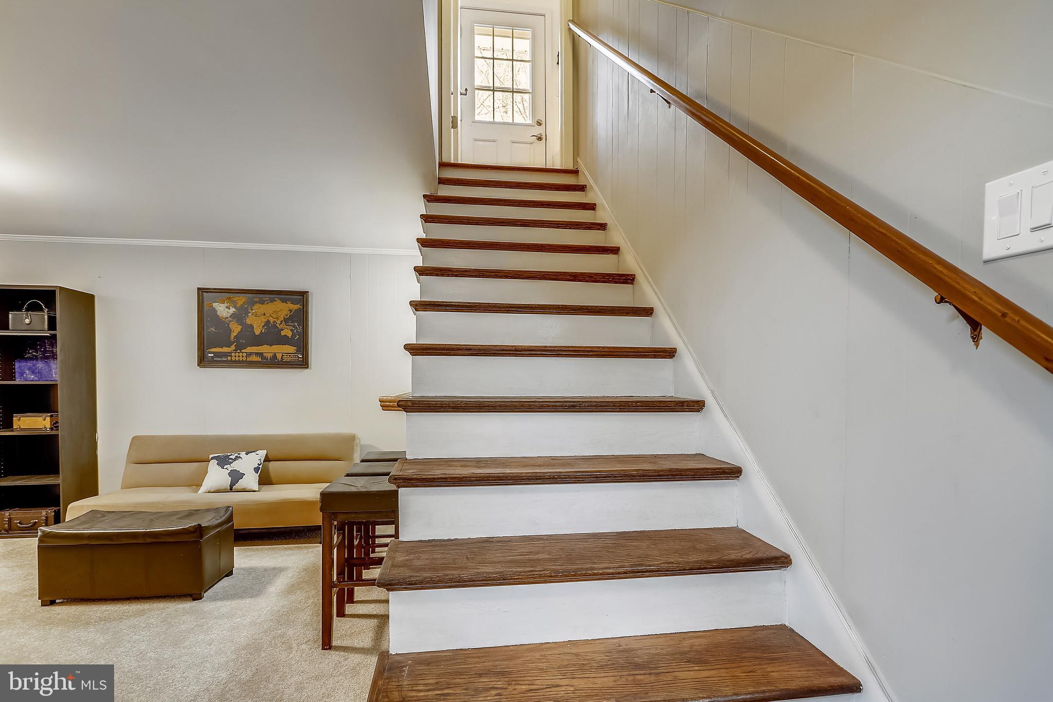 6671 Ridgeway Drive Springfield, VA 22150 - Photo 31 of 53 a view of entryway and hall with wooden floor