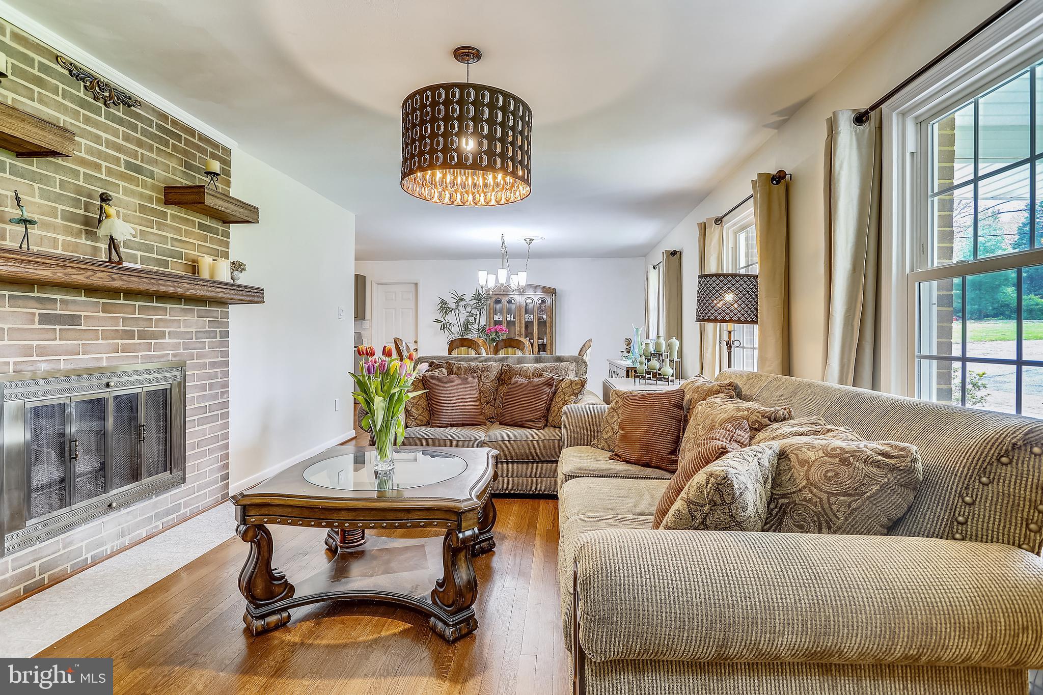 6671 Ridgeway Drive Springfield, VA 22150 - Photo 5 of 53 a living room with furniture and a fireplace