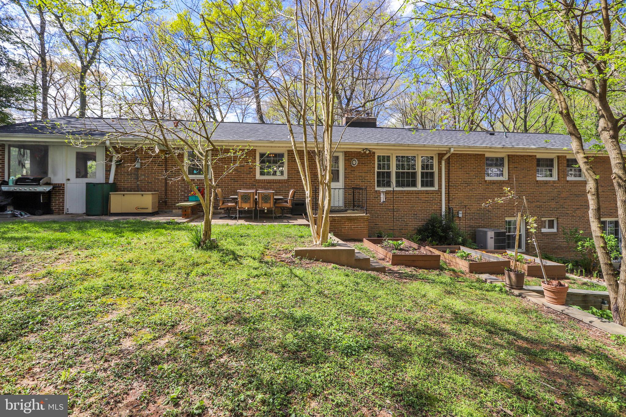 6671 Ridgeway Drive Springfield, VA 22150 - Photo 41 of 53 a view of a house with a yard and sitting area